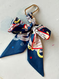 Skinny scarf bag accessory