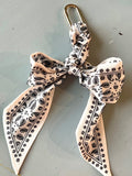 Skinny scarf bag accessory