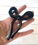 Bow claw clip