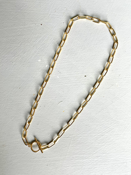 Gold charm necklaces