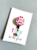 Pink badge reels