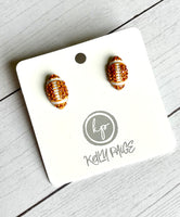 Mini football stud earrings