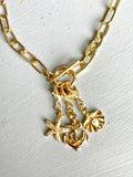 Gold charm necklaces